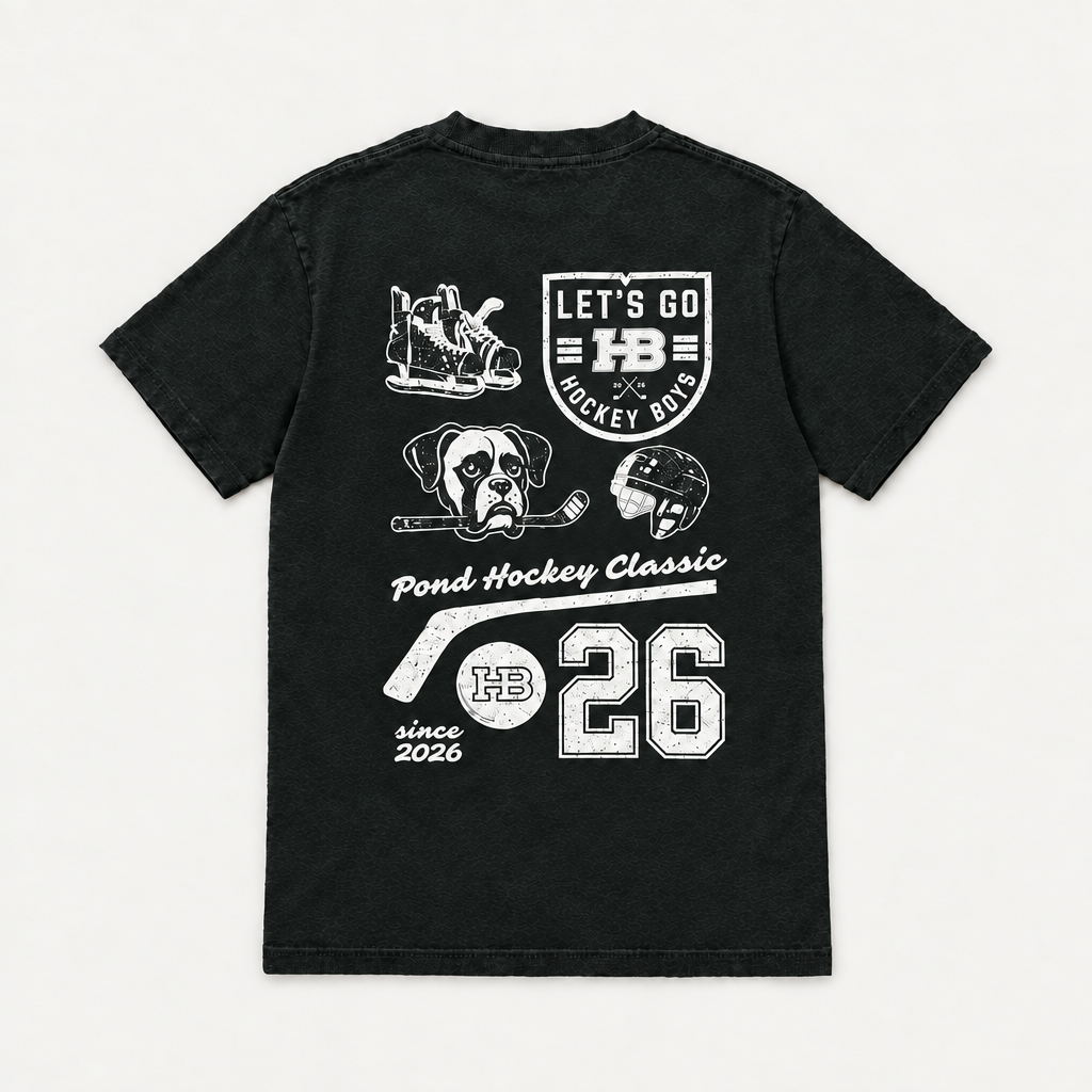 Back view of a charcoal youth hockey t-shirt with the Pond Hockey Classic 26 graphic on a warm off-white background.